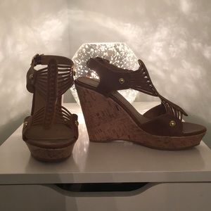 Brown open toe wedge shoe